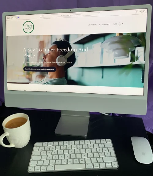 A computer with the Thrive Inside Online Meditation Course on the screen.
